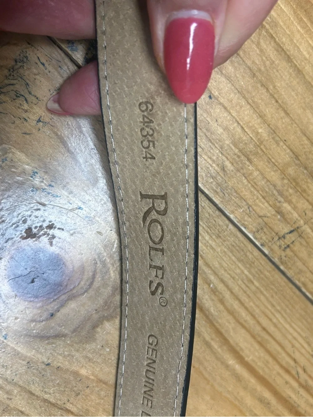 Rolfs Embossed patent leather belt. Size small adjustable versatile styling